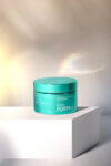 green container on a white box