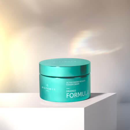 green container on a white box